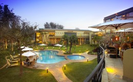 How To Gorilla Track In Rwanda - Serena Hotel pool, Kigali, Rwanda
