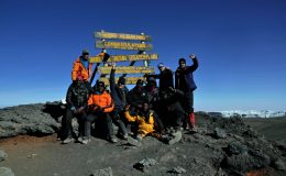 Francis successfully summiting Kilimanjaro with Summits Africa - Uhuru Peak 