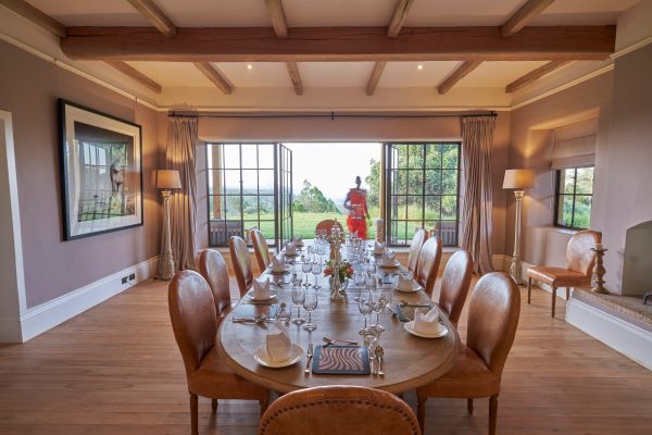 The dining room with views out onto the garden at Lolldaiga house